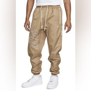 NWOT Men's Nike Standard Issue Therma-Fit
Loose Fit Pants in Brown size Medium